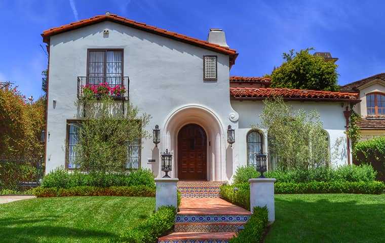 street view of a two story white house in vista